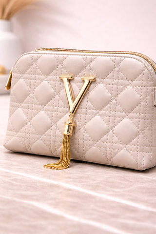 Luxury Off-White Quilted Crossbody Handbag with Gold V Emblem