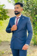 Classic Blue Double-Breasted Suit with Paisley Tie & White Shirt